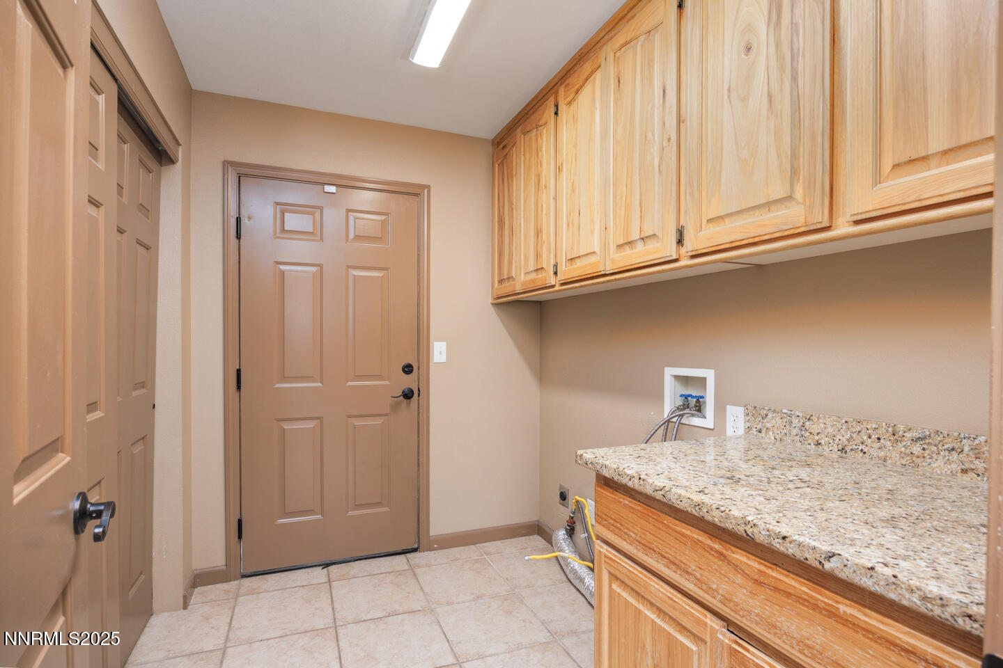 305 Cemetery Road Fallon, NV 89406 - Photo 20 of 26 a kitchen with granite countertop cabinets and sink