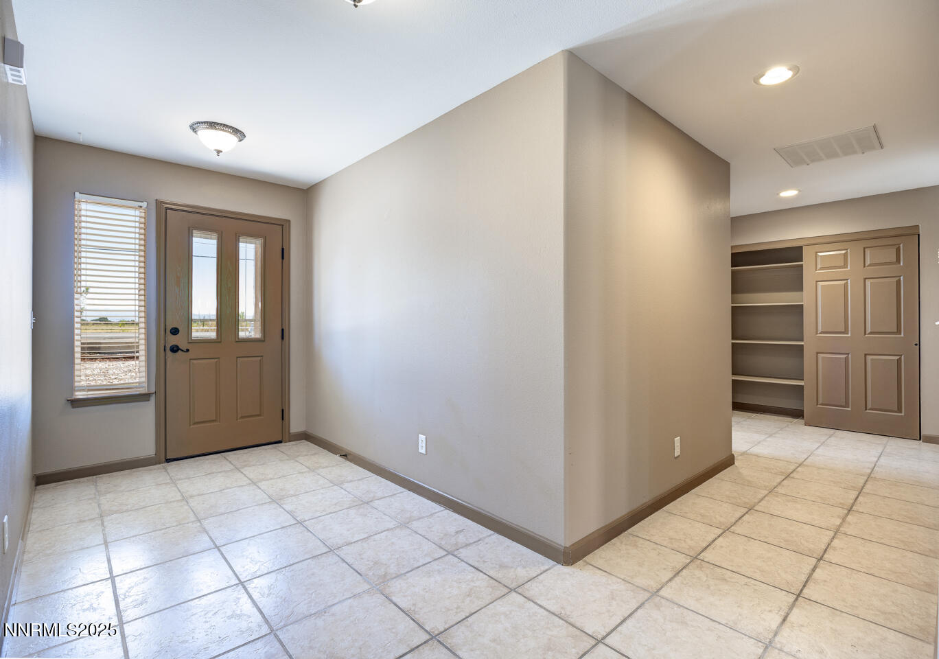 305 Cemetery Road Fallon, NV 89406 - Photo 2 of 26 a view of an empty room and window