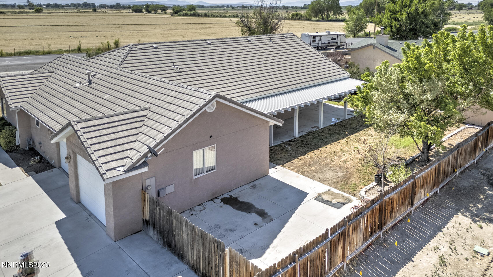 305 Cemetery Road Fallon, NV 89406 - Photo 23 of 26 a view of a terrace with wooden floor and outdoor seating