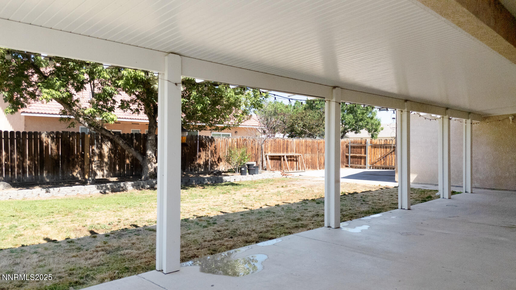 305 Cemetery Road Fallon, NV 89406 - Photo 24 of 26 a view of a porch with a yard