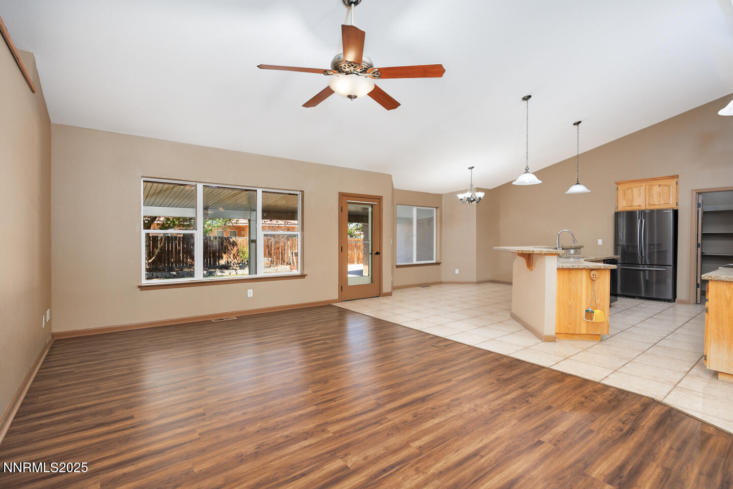 305 Cemetery Road Fallon, NV 89406 - Photo 3 of 26 a view of an empty room with a kitchen