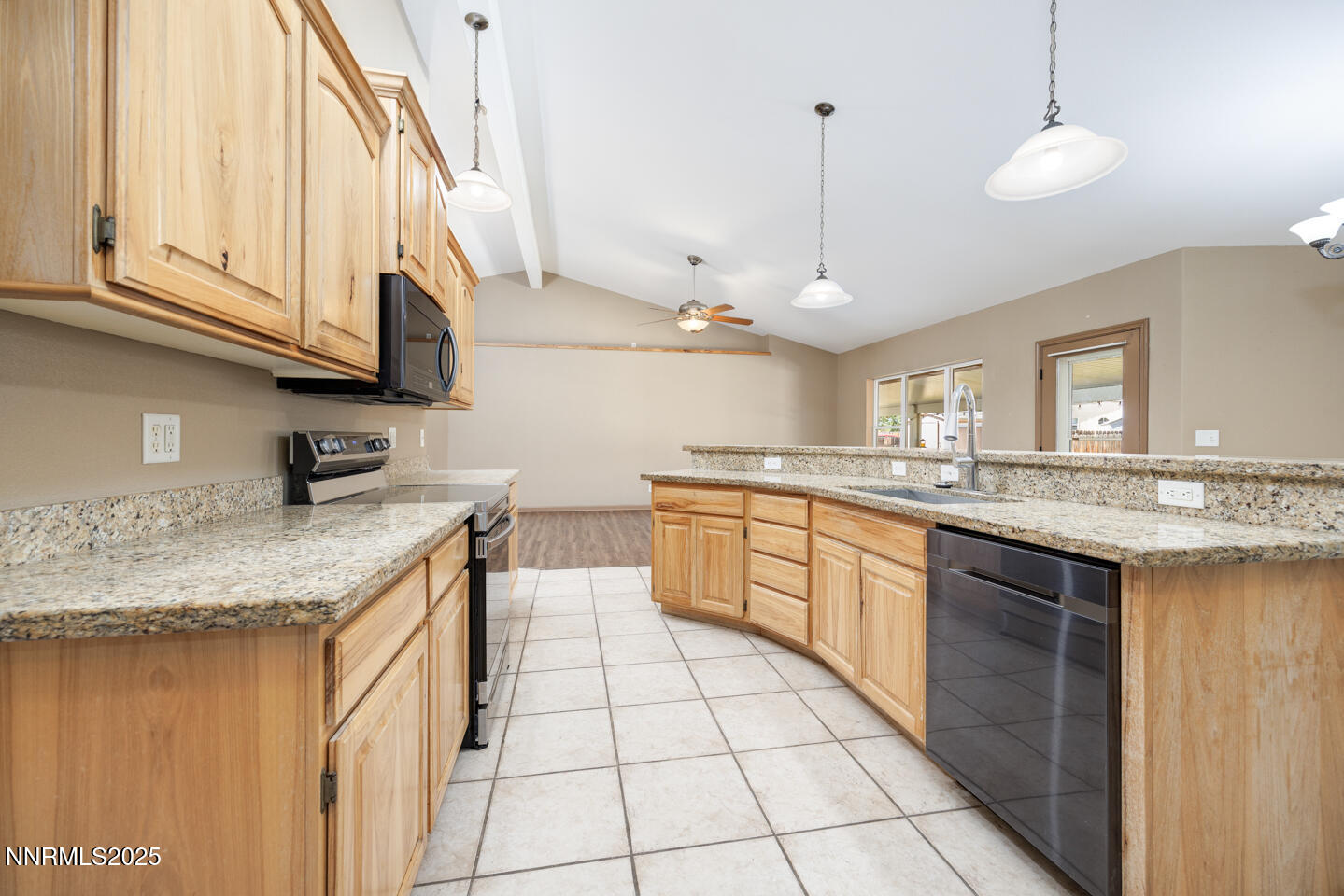305 Cemetery Road Fallon, NV 89406 - Photo 6 of 26 a kitchen with stainless steel appliances granite countertop a sink stove and cabinets