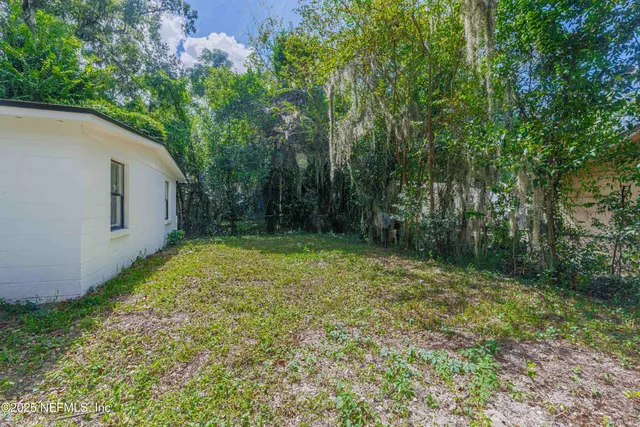 a view of outdoor space and yard