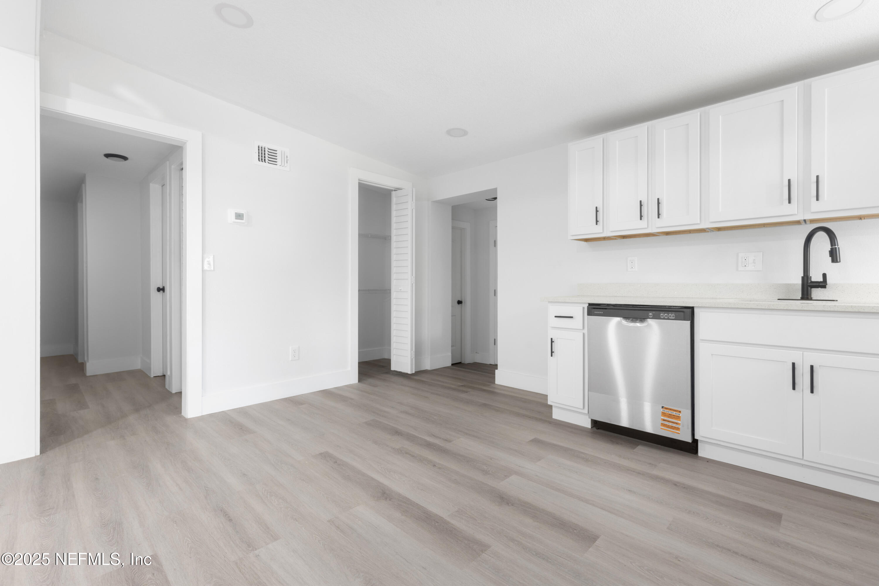 9166 3rd Avenue Jacksonville, FL 32208 - Photo 9 of 23 a view of a kitchen with wooden floor