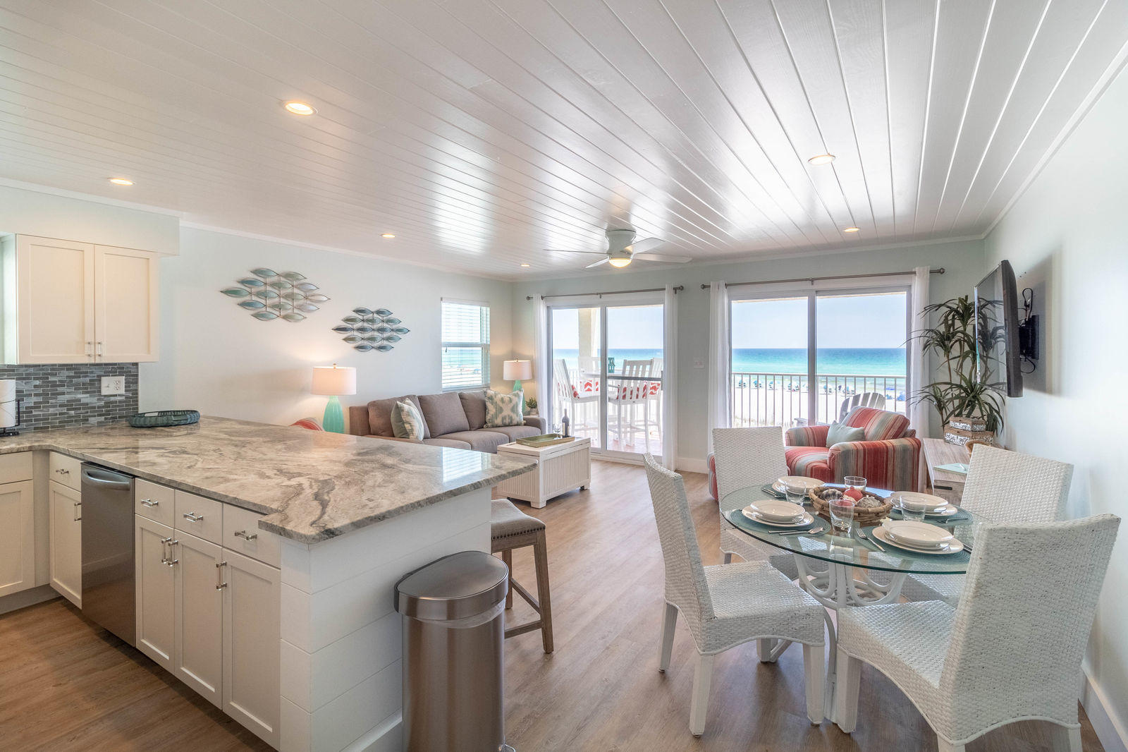 595 Eastern Lake Road, Unit 206 Santa Rosa Beach, FL 32459 - Photo 13 of 33 a living room with stainless steel appliances granite countertop furniture and a wooden floor