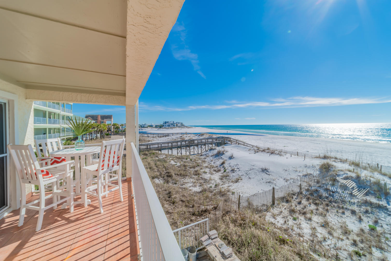 595 Eastern Lake Road, Unit 206 Santa Rosa Beach, FL 32459 - Photo 30 of 33 a view of a balcony with chair and table