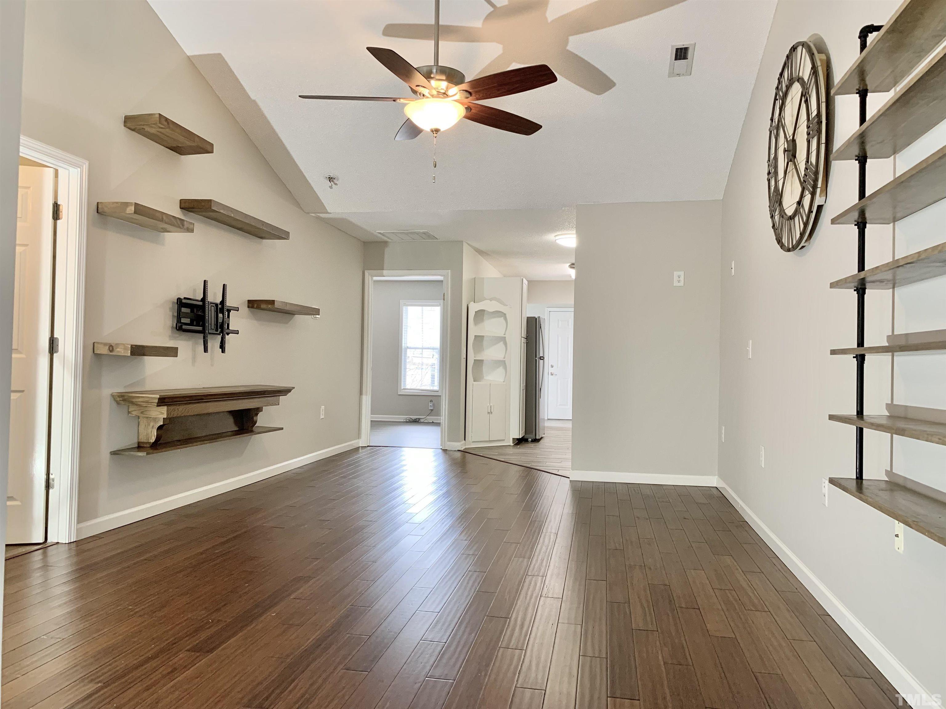 11320 Clubhaven Place, Unit 102 Raleigh, NC 27617 - Photo 7 of 15 a view of an entryway with wooden floor