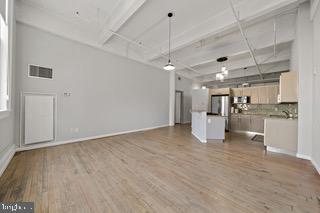1228-32 Arch Street, Unit 5B Philadelphia, PA 19107 - Photo 7 of 18 Living room/kitchen