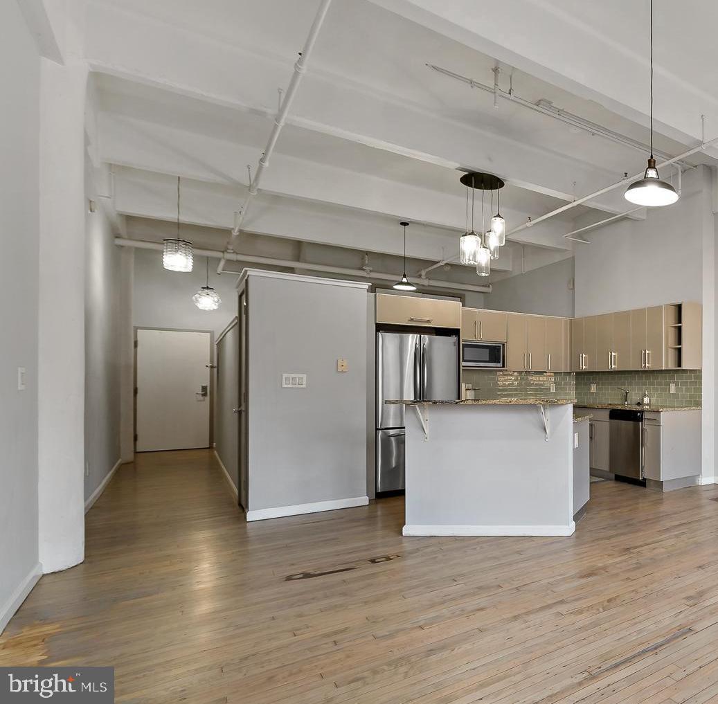 1228-32 Arch Street, Unit 5B Philadelphia, PA 19107 - Photo 8 of 18 Huge open kitchen/living room