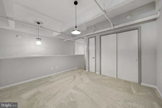 a view of a kitchen with a chandelier