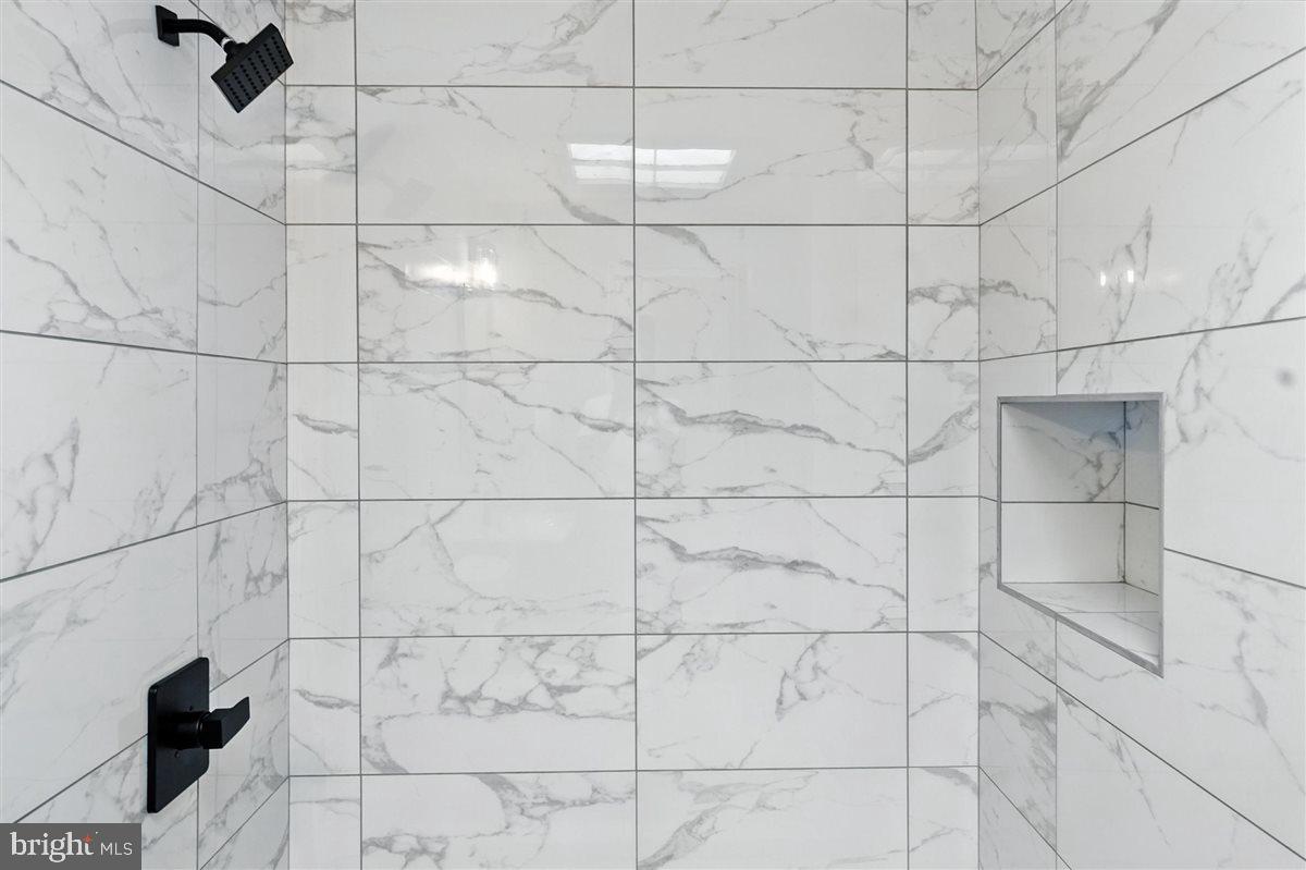 2613 Franklin Street Northeast Washington, DC 20018 - Photo 16 of 29 a bathroom with a shower