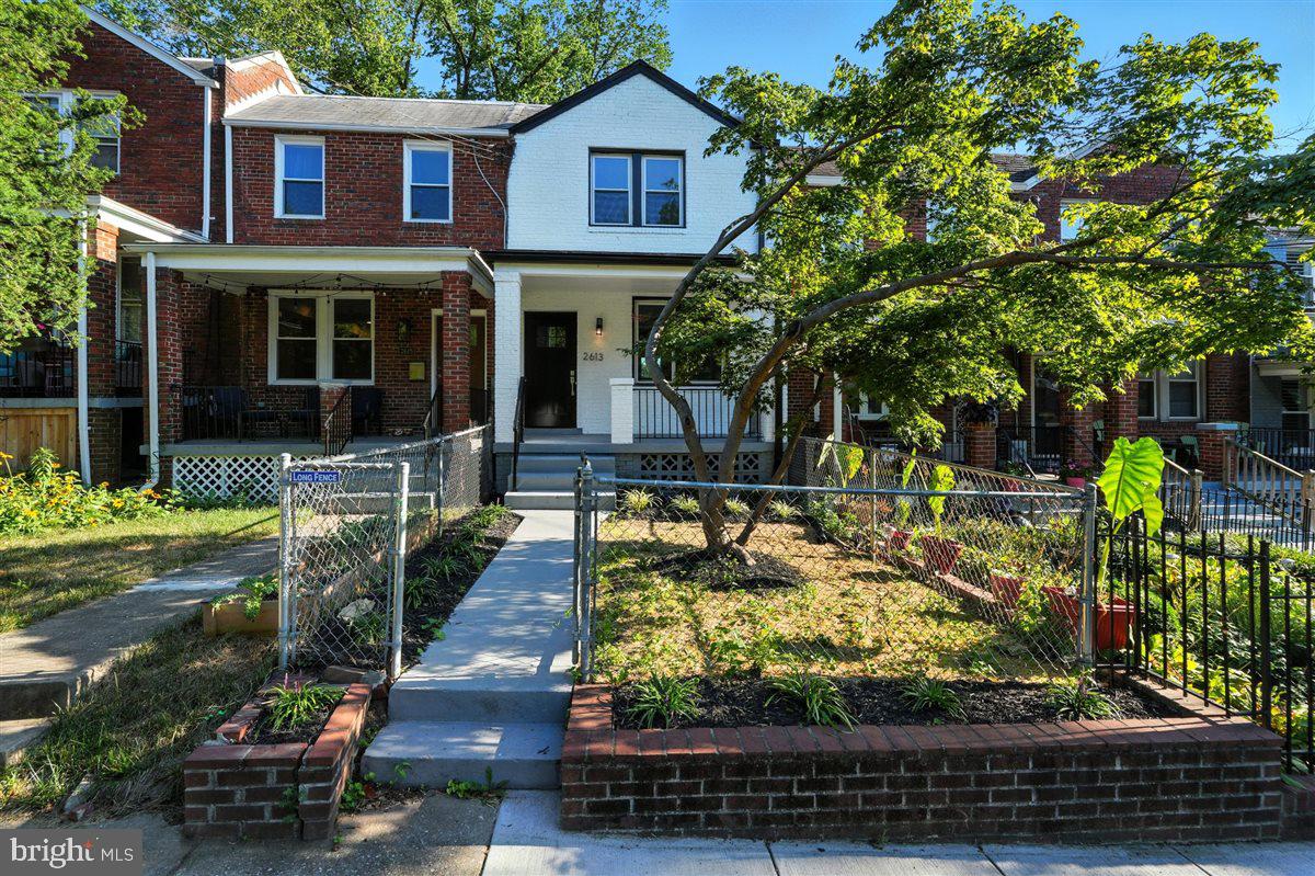 2613 Franklin Street Northeast Washington, DC 20018 - Photo 2 of 29 a front view of a house with garden