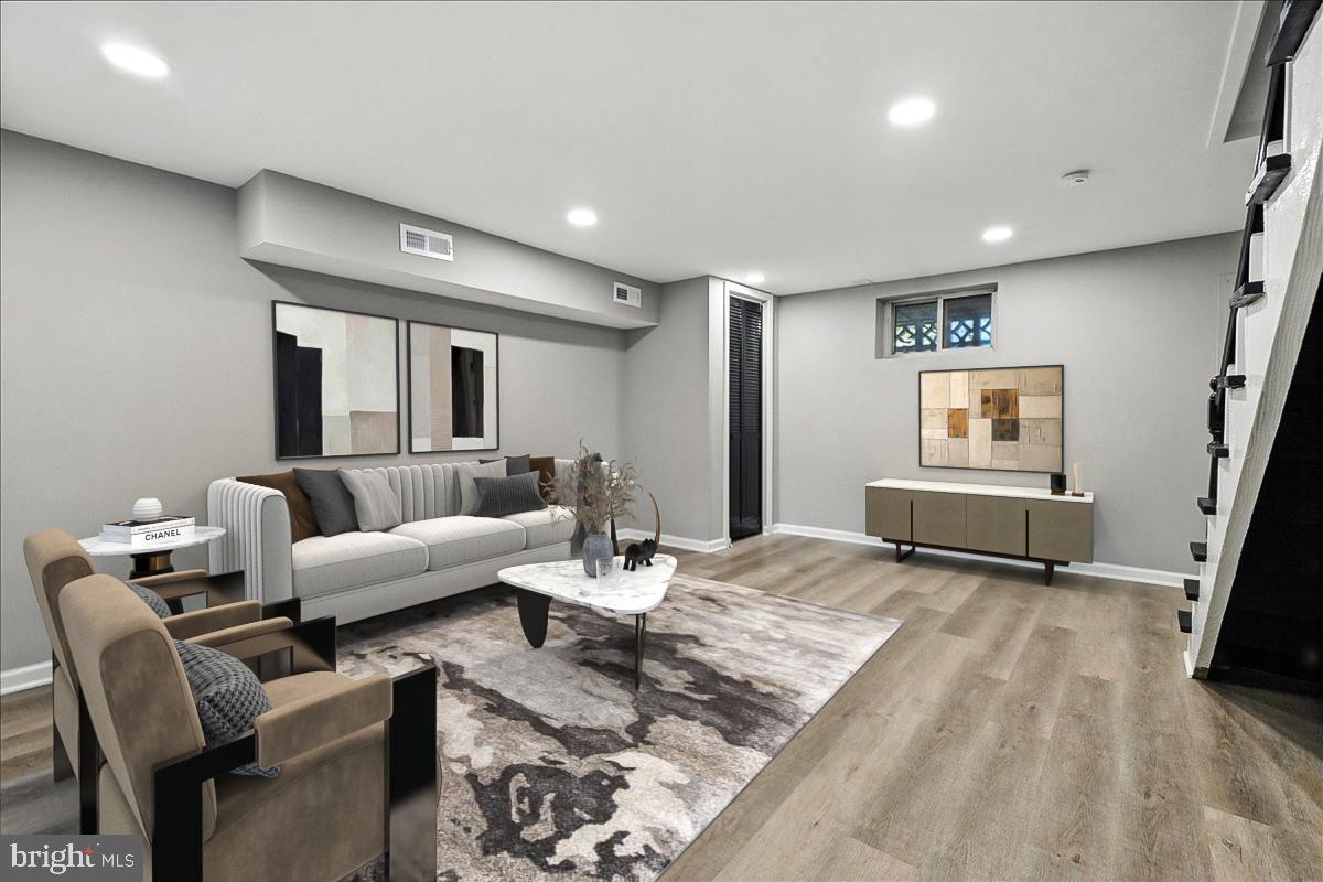 2613 Franklin Street Northeast Washington, DC 20018 - Photo 21 of 29 a living room with furniture and wooden floor