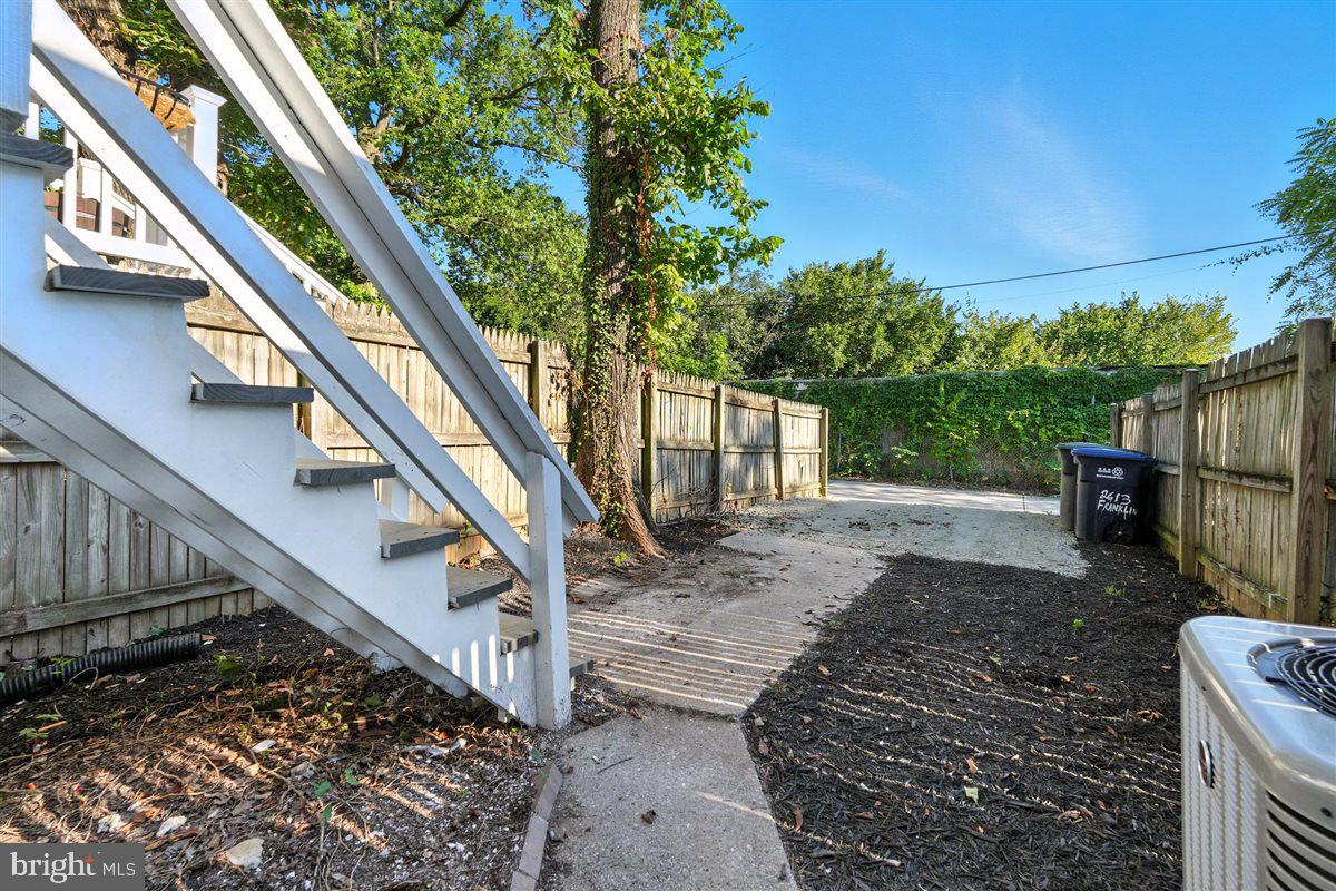 2613 Franklin Street Northeast Washington, DC 20018 - Photo 23 of 29 a view of entryway with wooden stairs