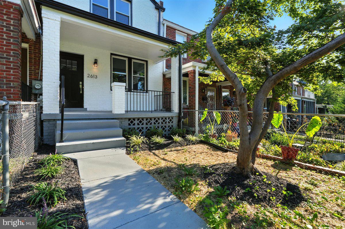 2613 Franklin Street Northeast Washington, DC 20018 - Photo 26 of 29 a view of a house with backyard and sitting area