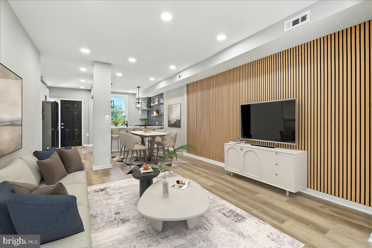 2613 Franklin Street Northeast Washington, DC 20018 - Photo 4 of 29 a living room with furniture and a flat screen tv