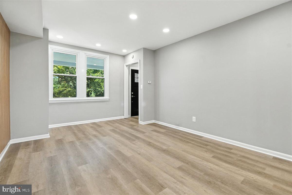 2613 Franklin Street Northeast Washington, DC 20018 - Photo 5 of 29 a view of an empty room with a window