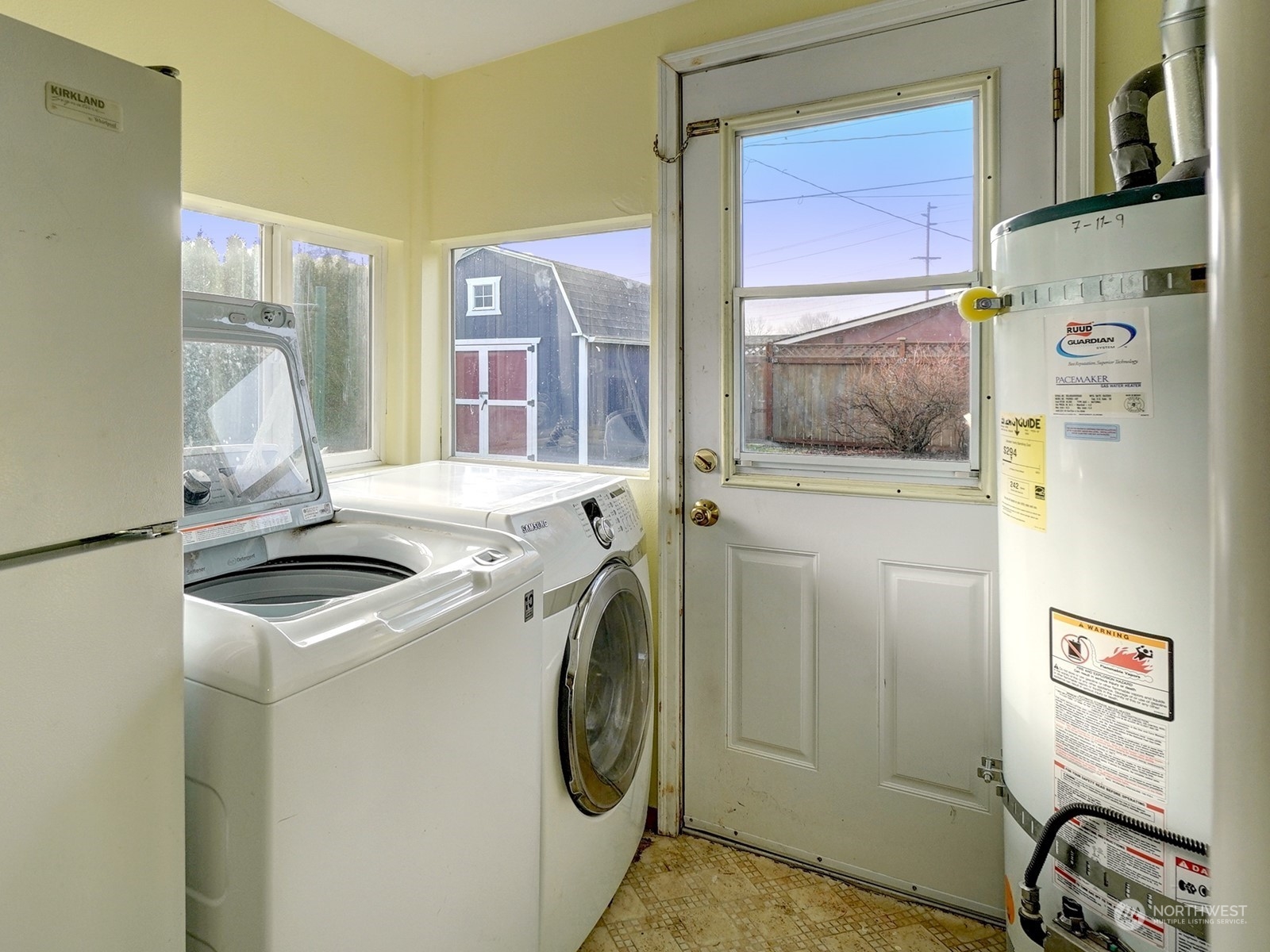 1206 Sumner Avenue Sumner, WA 98390 - Photo 16 of 30 a utility room with dryer and washer