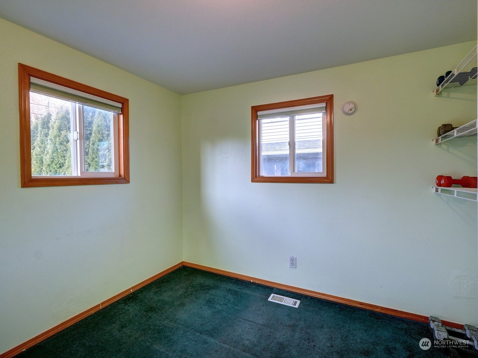 1206 Sumner Avenue Sumner, WA 98390 - Photo 18 of 30 an empty room with a window