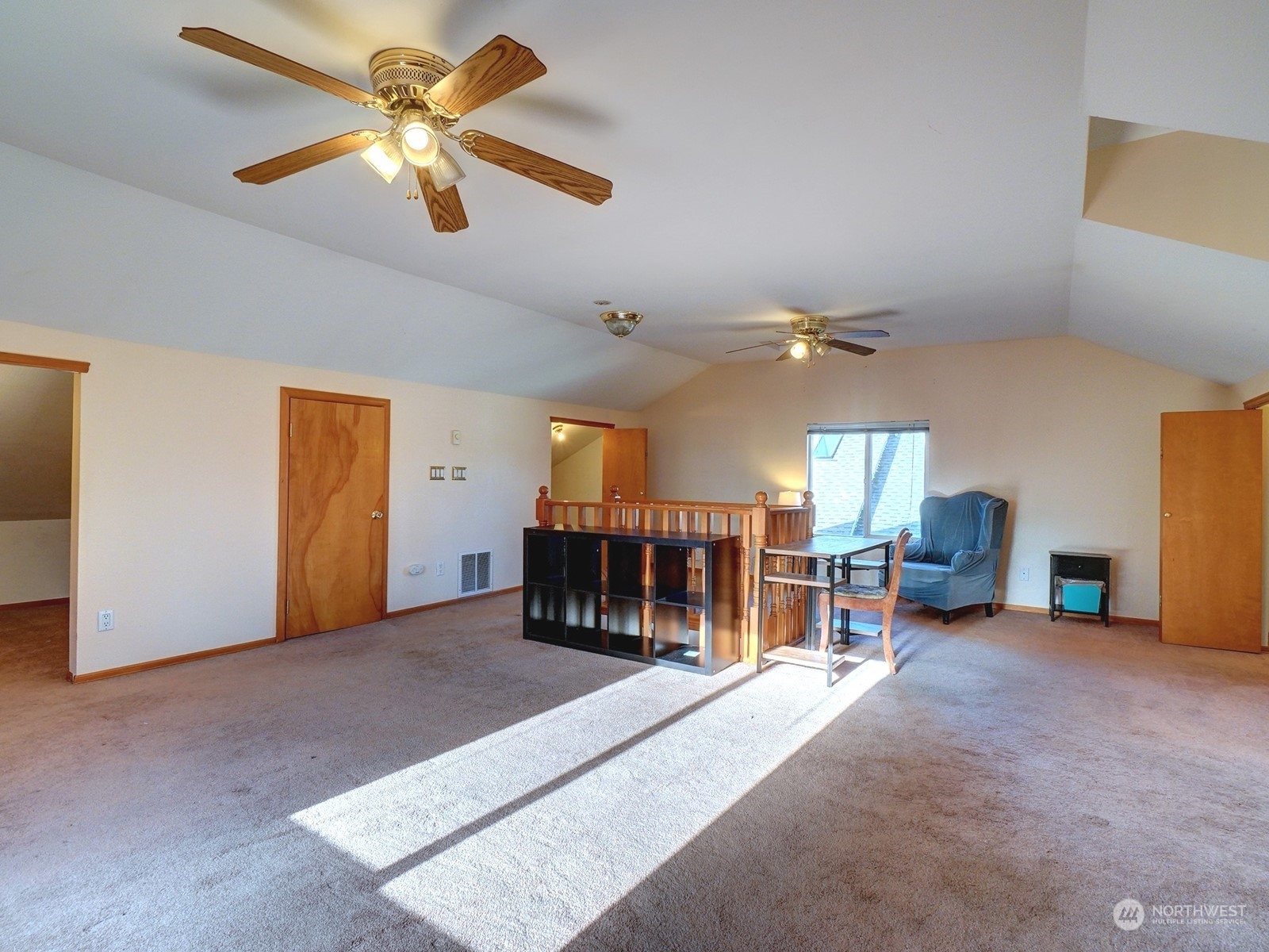 1206 Sumner Avenue Sumner, WA 98390 - Photo 22 of 30 a living room with furniture and a chandelier
