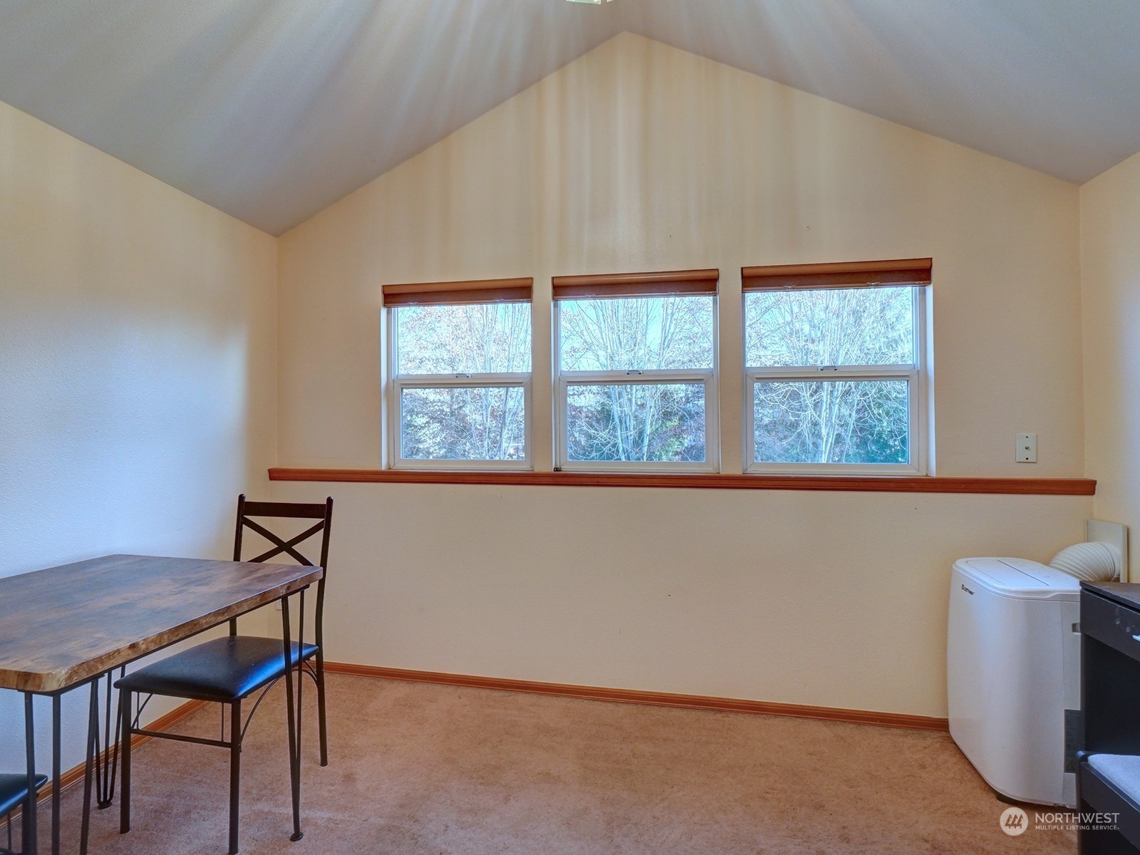 1206 Sumner Avenue Sumner, WA 98390 - Photo 24 of 30 a workspace with furniture and window