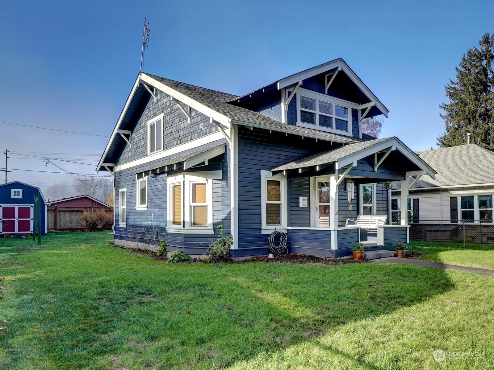 1206 Sumner Avenue Sumner, WA 98390 - Photo 29 of 30 a front view of a house with a yard