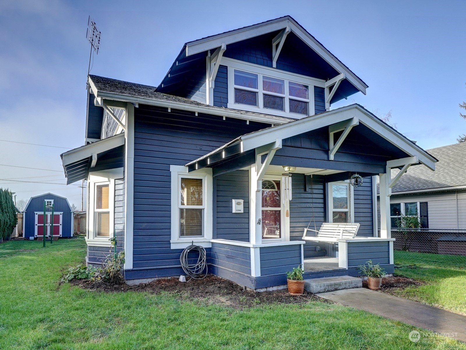 1206 Sumner Avenue Sumner, WA 98390 - Photo 30 of 30 a front view of a house with a yard