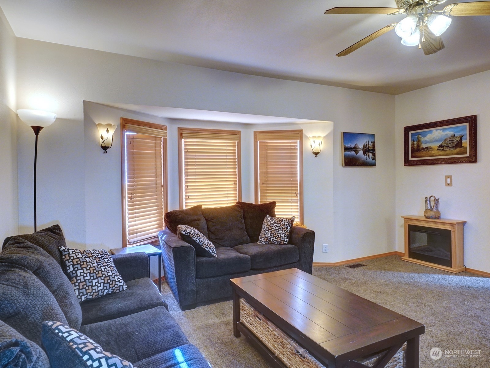 1206 Sumner Avenue Sumner, WA 98390 - Photo 5 of 30 a living room with furniture and a flat screen tv