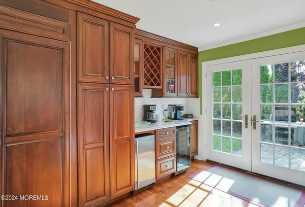 a kitchen with stainless steel appliances granite countertop a stove and a refrigerator
