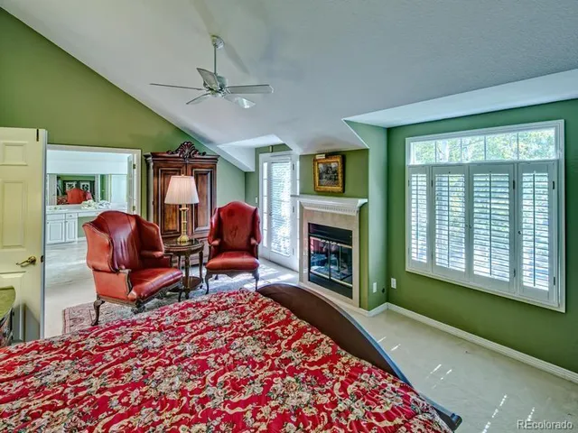 a view of a chair and table in the balcony