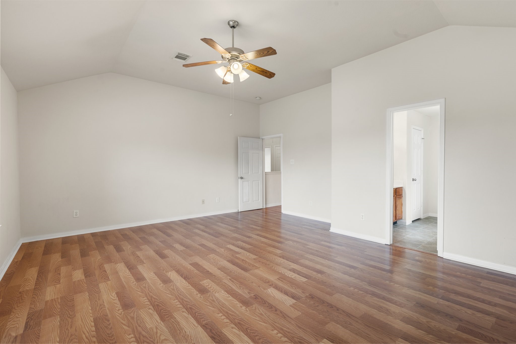 3111 Holly Ranch Drive Katy, TX 77494 - Photo 27 of 28 a view of an empty room with wooden floor