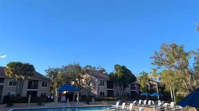 a view of a town with palm trees