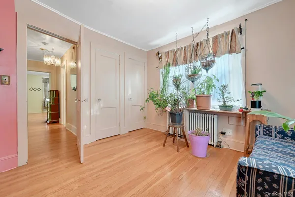 a view of kitchen with furniture and wooden floor