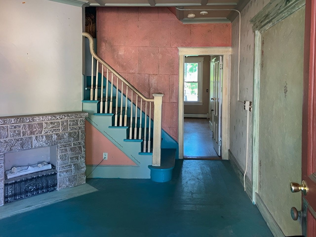 11-15 Perry Street North Adams, MA 01247 - Photo 5 of 22 a view of entryway and hall with wooden floor