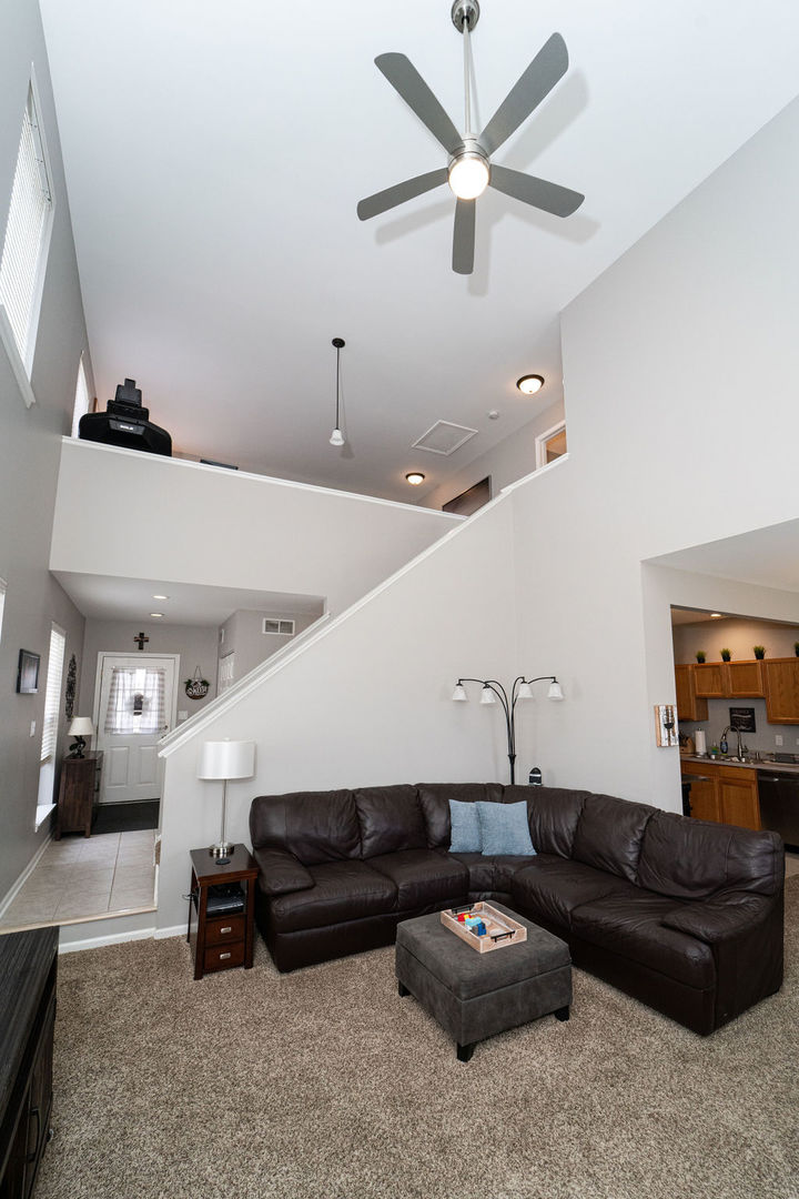 364 Littleton Trail Elgin, IL 60120 - Photo 11 of 36 a living room with furniture and a couch