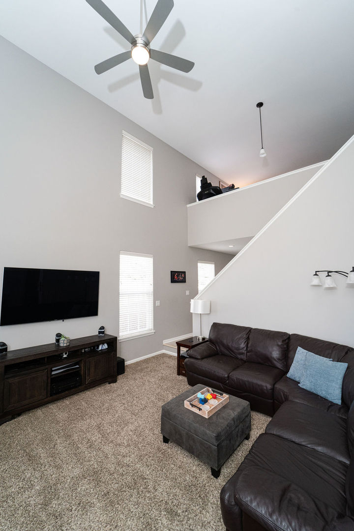 364 Littleton Trail Elgin, IL 60120 - Photo 12 of 36 a living room with furniture and a flat screen tv