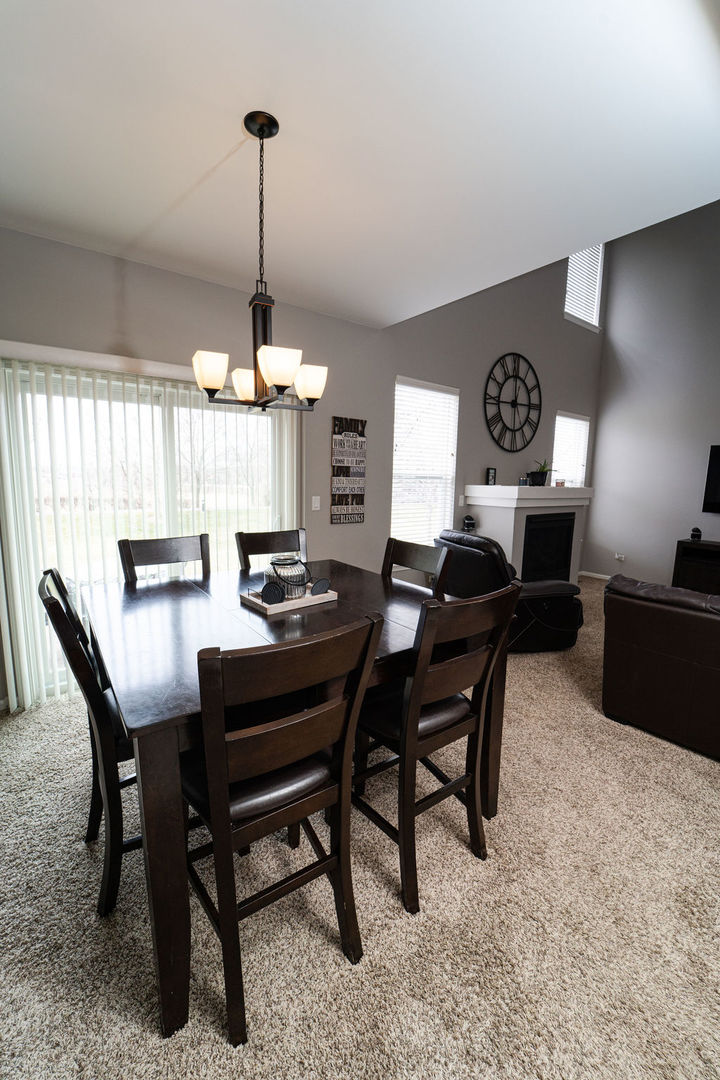 364 Littleton Trail Elgin, IL 60120 - Photo 16 of 36 a view of a dining room with furniture