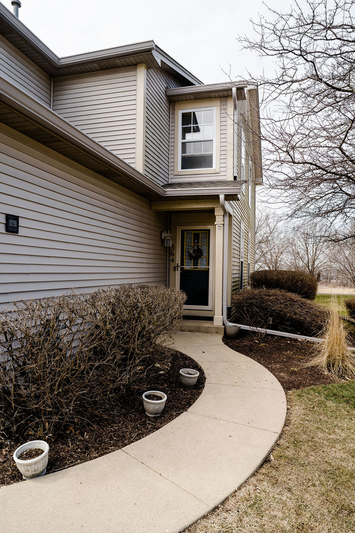 364 Littleton Trail Elgin, IL 60120 - Photo 2 of 36 a view of a house with a yard