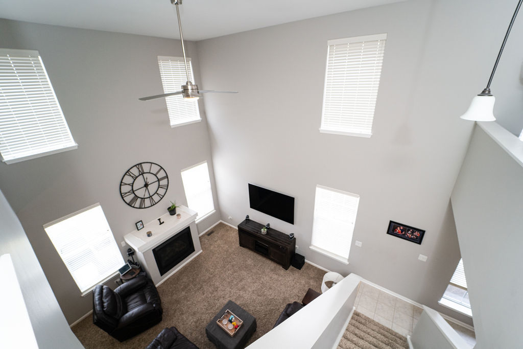 364 Littleton Trail Elgin, IL 60120 - Photo 22 of 36 a view of workspace with furniture and flat screen tv