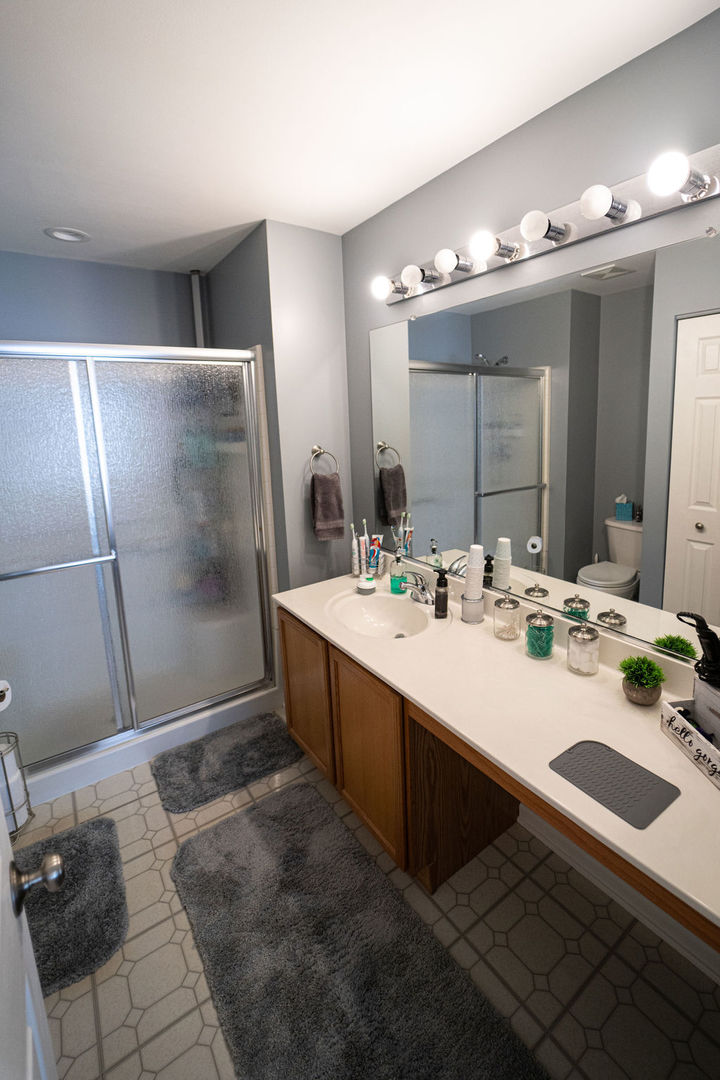 364 Littleton Trail Elgin, IL 60120 - Photo 34 of 36 a bathroom with a sink double vanity and a mirror