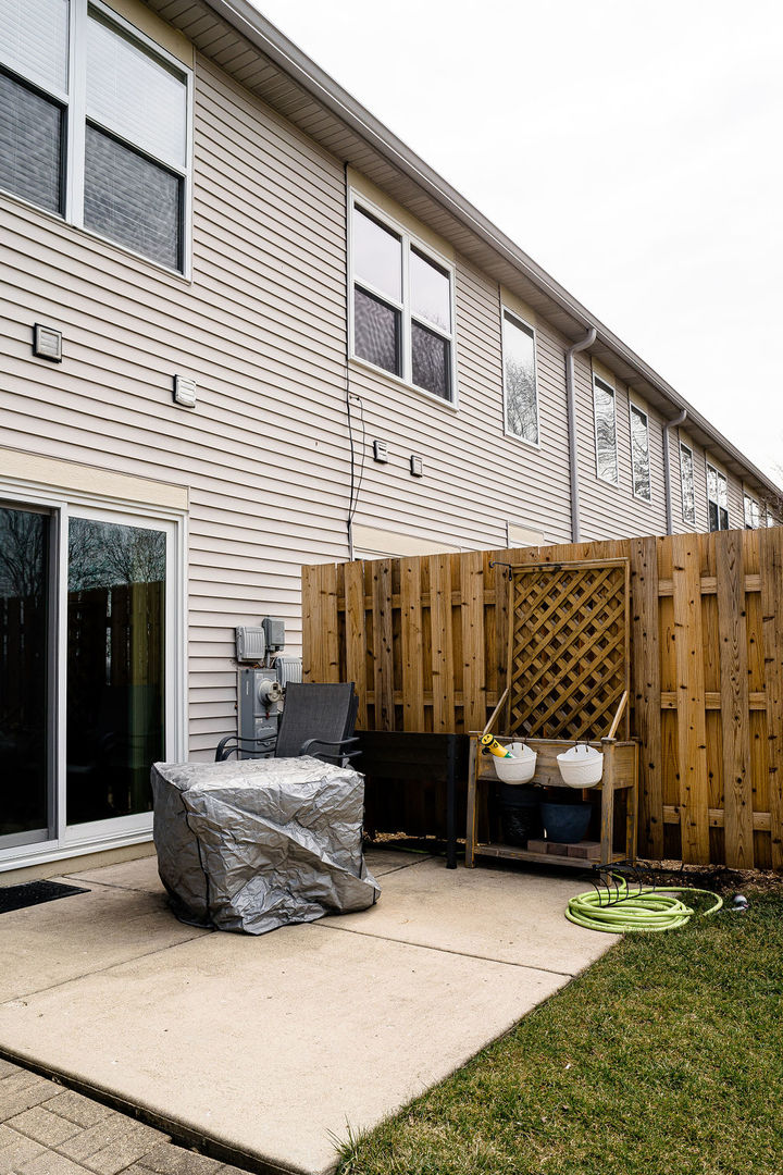 364 Littleton Trail Elgin, IL 60120 - Photo 35 of 36 a view of a house with a barbeque and wooden stairs