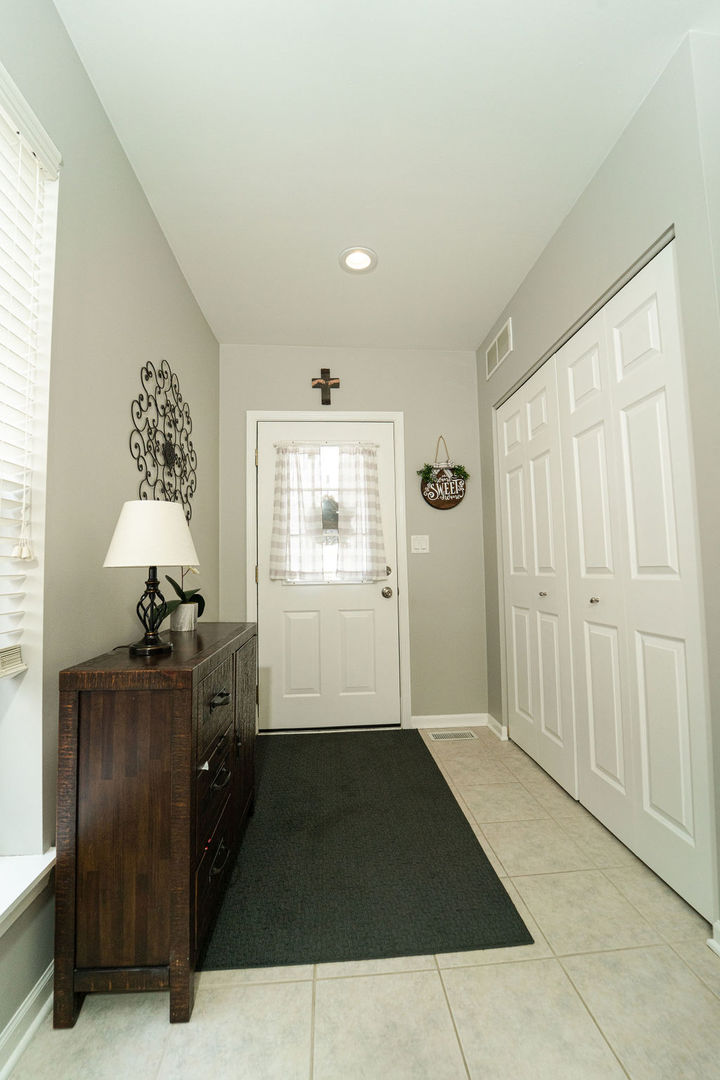 364 Littleton Trail Elgin, IL 60120 - Photo 5 of 36 a bedroom with a bed and a window