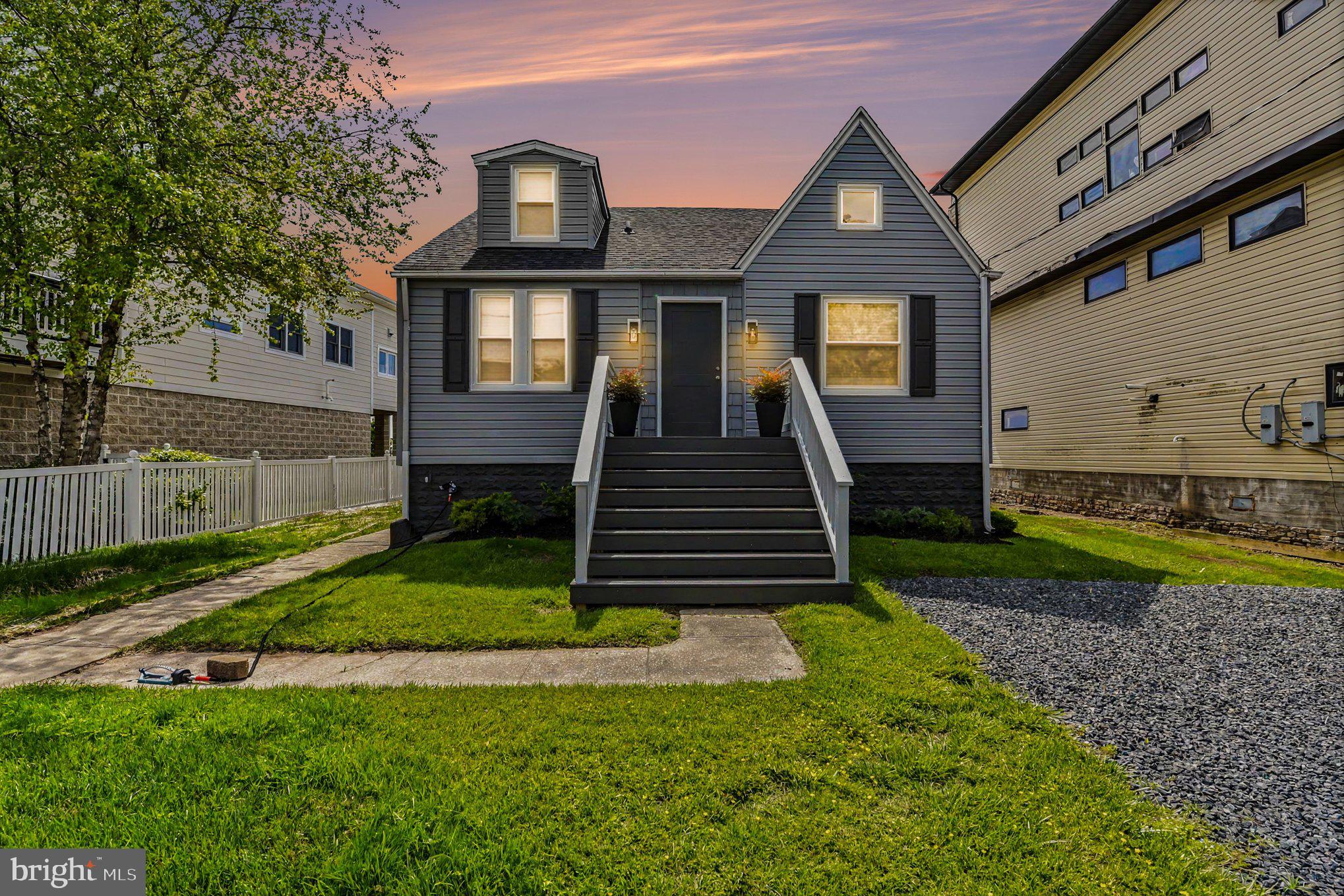 9135 Cuckold Point Road Sparrows Point, MD 21219 - Photo 41 of 44 a front view of a house with garden