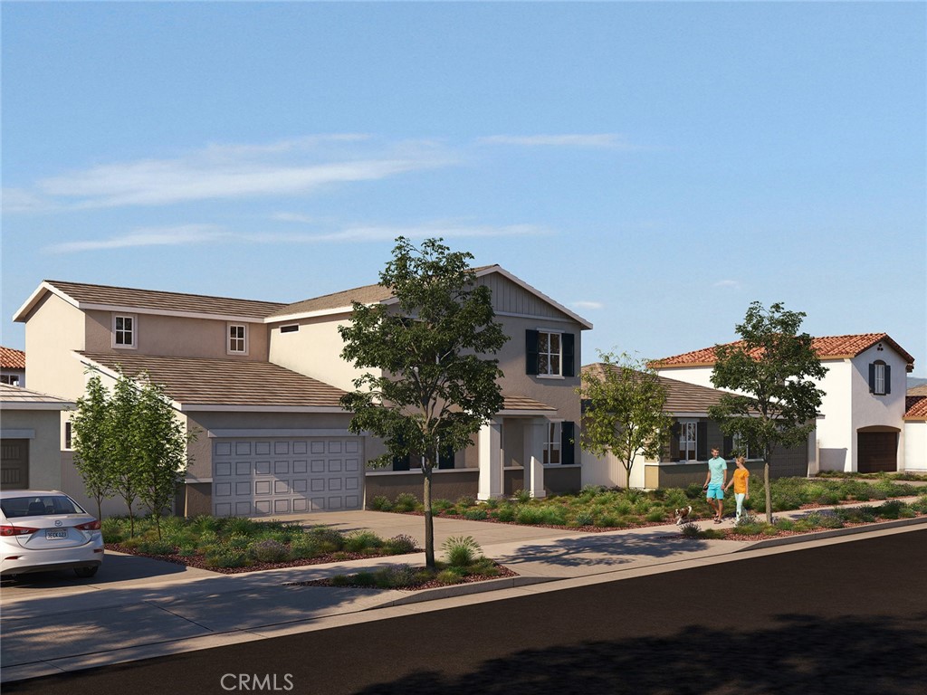 2147 Bergamot Street Redlands, CA 92374 - Photo 15 of 20 a front view of a house with street