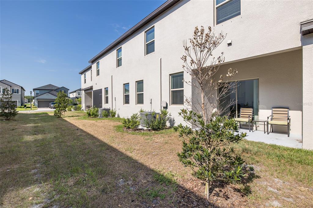 3072 Hover Hall Lane New Port Richey, FL 34655 - Photo 13 of 51 a front view of a house with garden