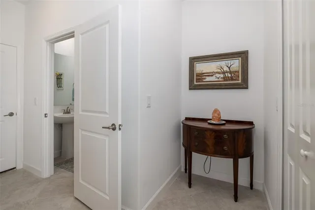 a kitchen with sink stove and cabinets