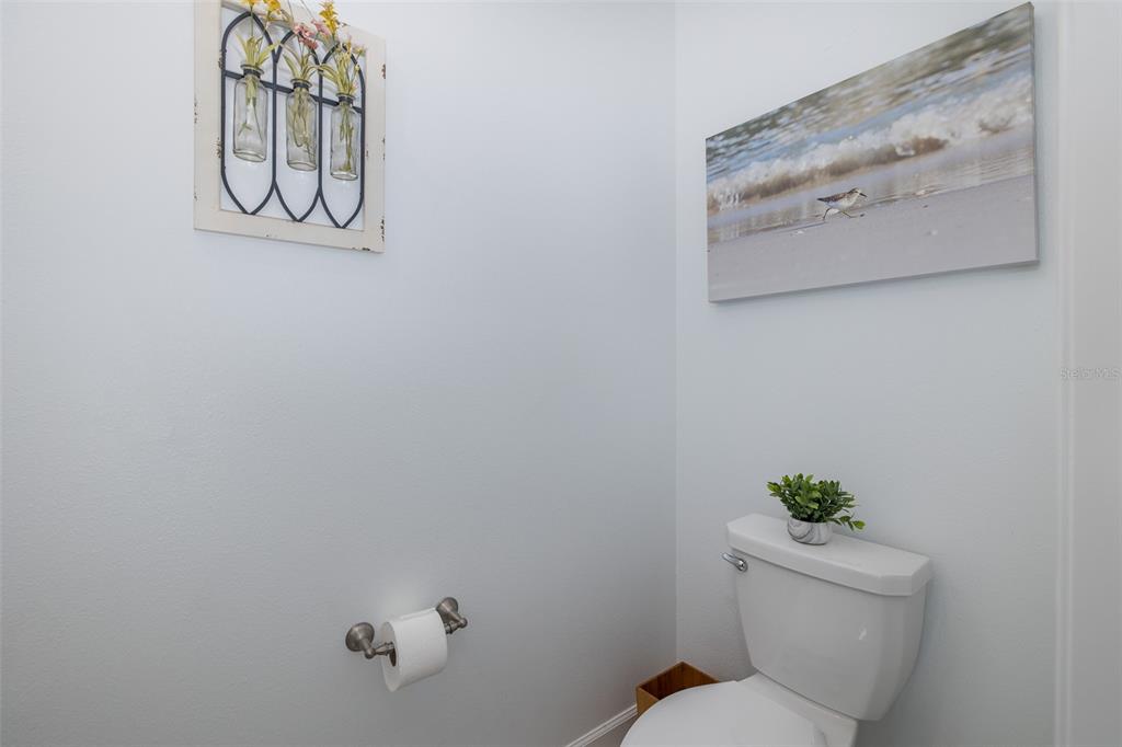 3072 Hover Hall Lane New Port Richey, FL 34655 - Photo 26 of 51 a white toilet sitting next to a white walls