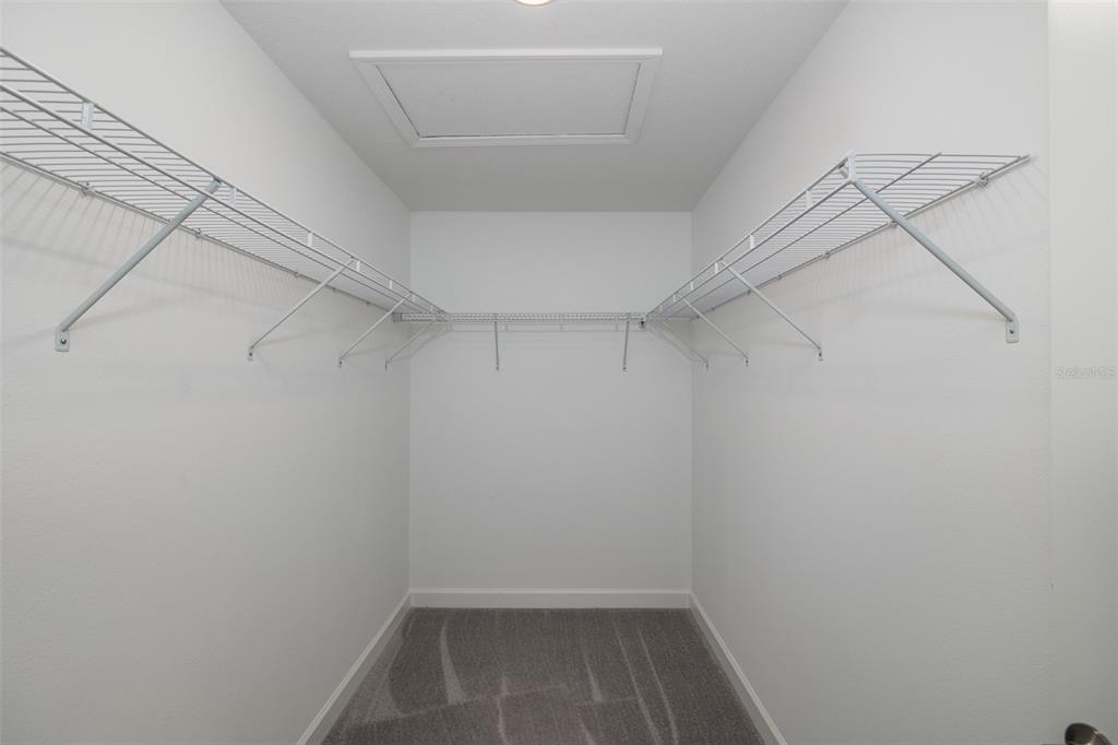 3072 Hover Hall Lane New Port Richey, FL 34655 - Photo 36 of 51 a view of a room with racks on the wall