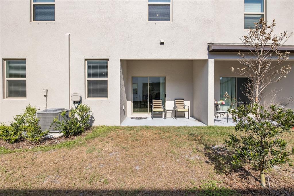 3072 Hover Hall Lane New Port Richey, FL 34655 - Photo 10 of 51 a front view of a house with a yard