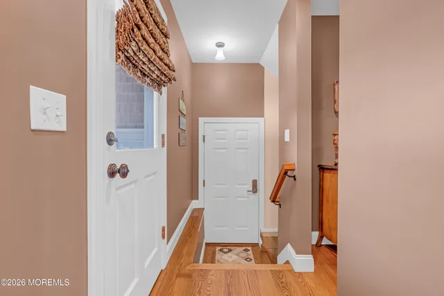 a living room with lots of furniture and toys